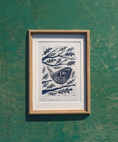 Thoughtfulness. Framed wren linocut