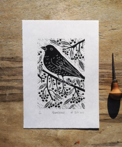 Alternative view of Abundance. Framed blackbird linocut
