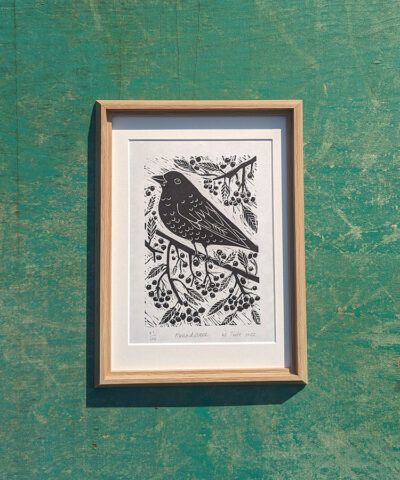 Abundance. Framed blackbird linocut