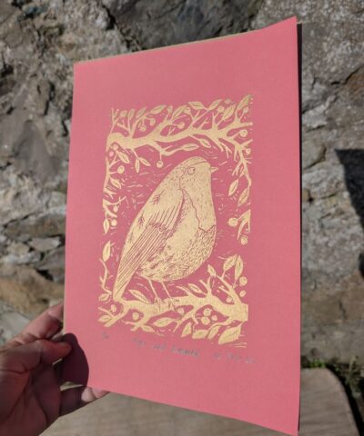 Hope and Renewal. Robin linocut, gold ink